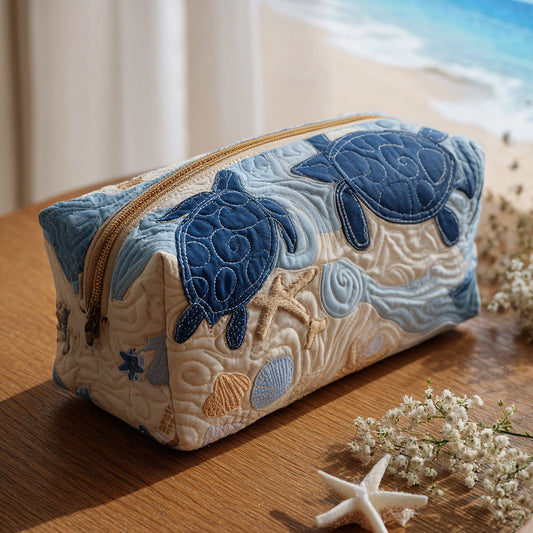 Beauty case trapuntato con conchiglie azzurre