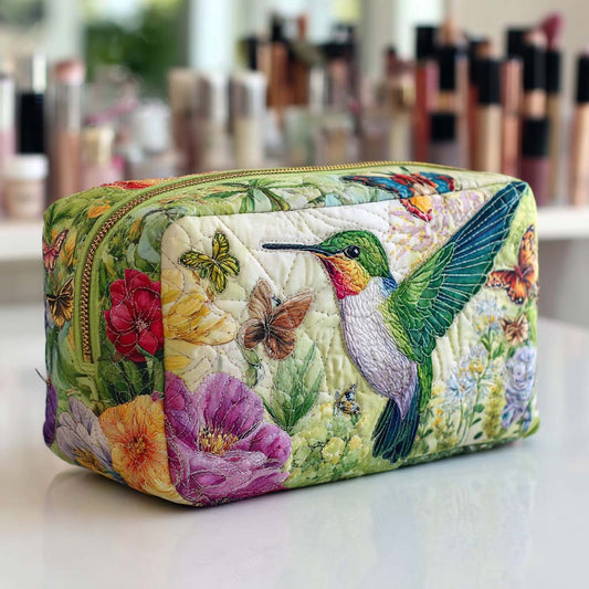 Beauty case trapuntato con fiori in movimento