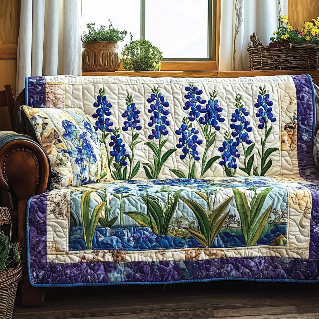 Copridivano trapuntato con fiori blu di campo