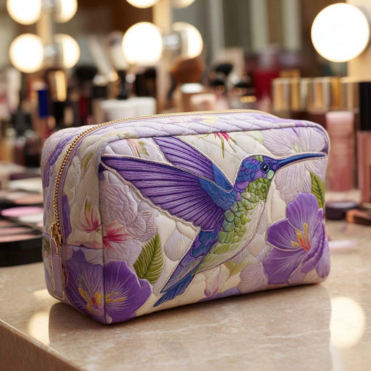 Beauty case trapuntato con volo floreale