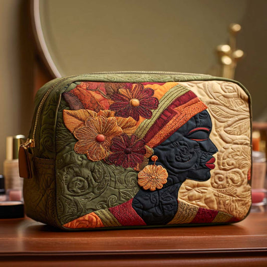 Beauty case trapuntato con fiori delicati
