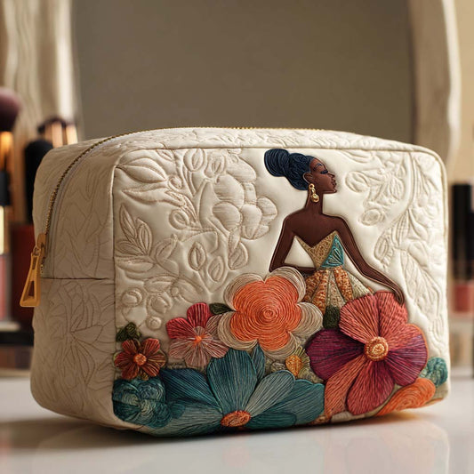 Beauty case trapuntato con fiori eleganti