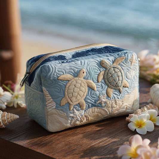 Beauty case trapuntato con conchiglie delicate